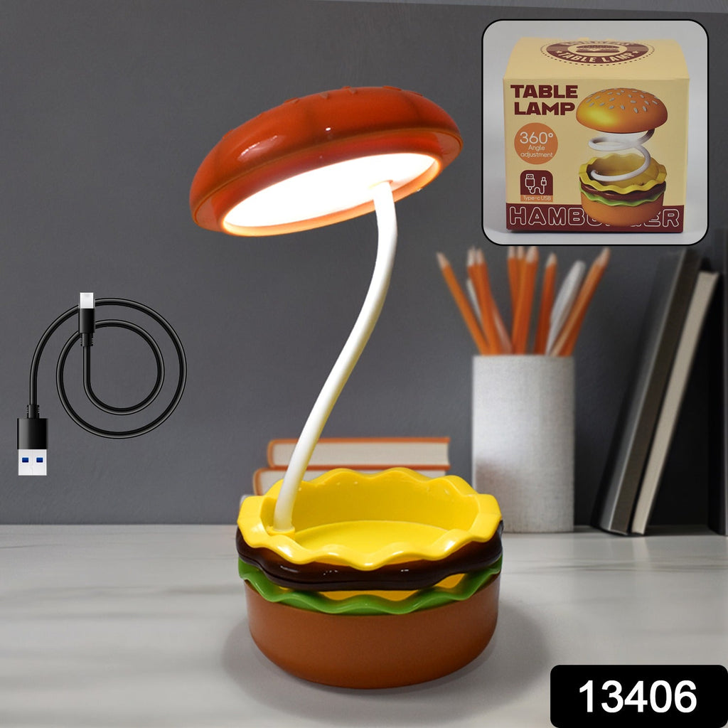 Child studying with the flexible burger LED night lamp on a desk.
