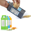 Quickslice 4-in-1 plastic vegetable slicer grater with multiple blades for versatile kitchen tasks.