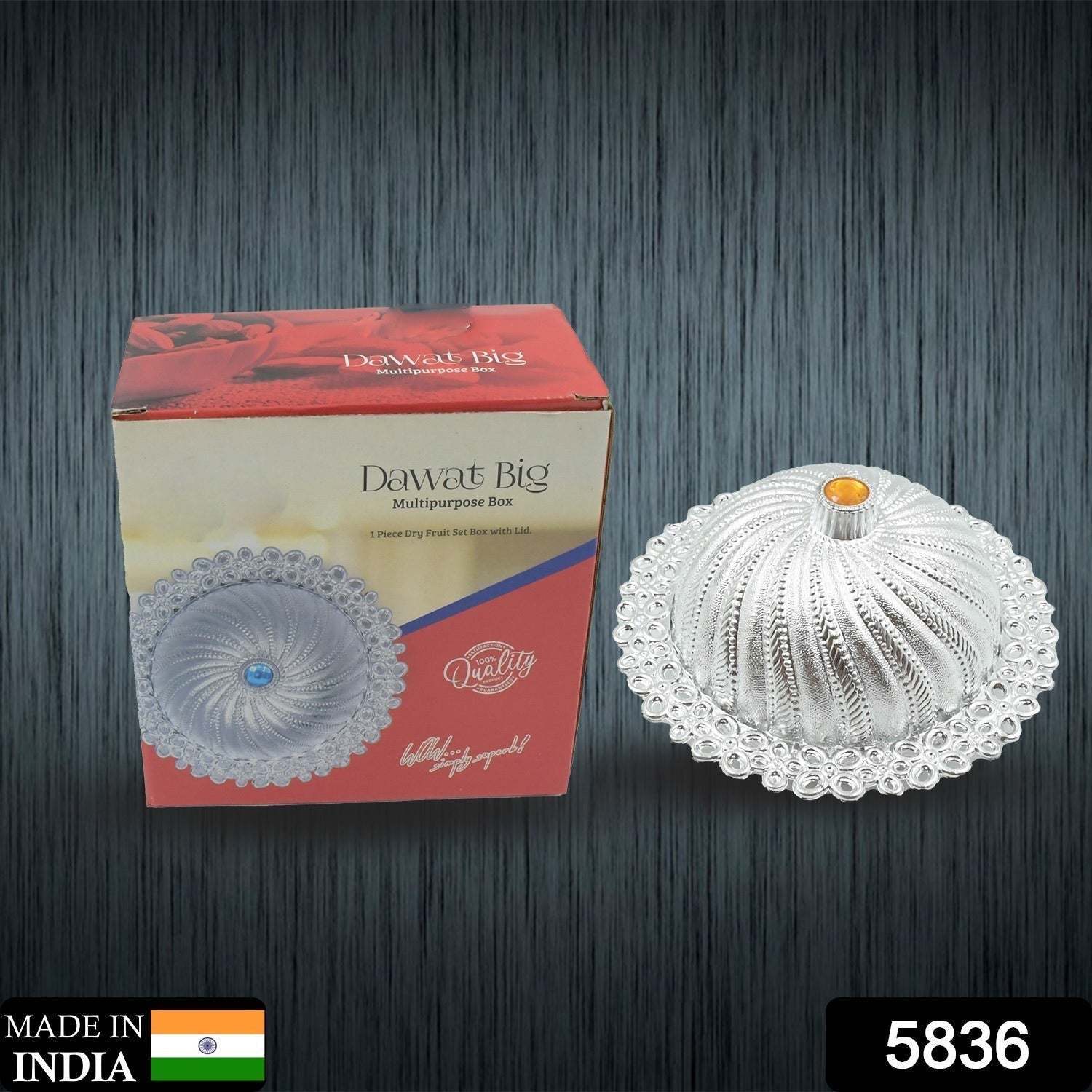 Stylish dry fruit storage box with lid closed, placed on a modern kitchen counter.