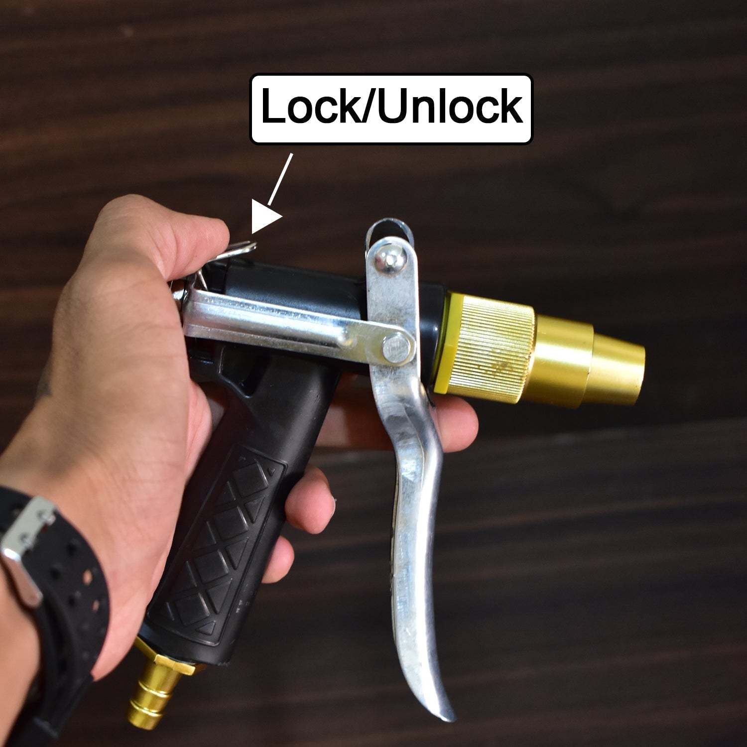 Trigger lock feature on the gold hose nozzle for continuous spraying.