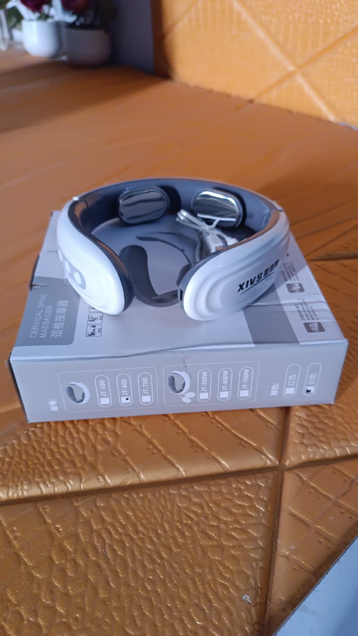 Closeup of electric massage device for neck and back with heat feature