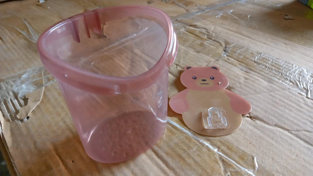 Multipurpose teddy bear wall mount holder, perfect for kids' dental hygiene items.