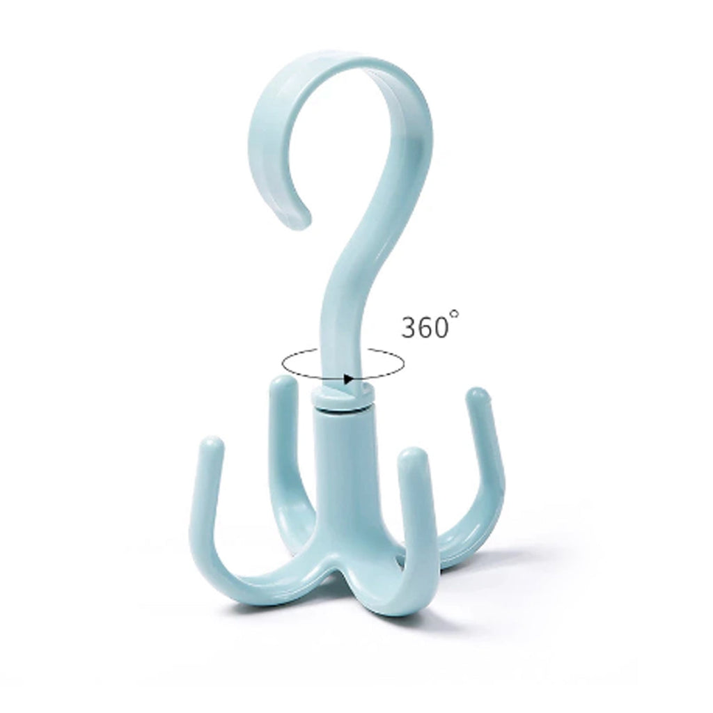 The 4-claw purse hanger hook in a wardrobe, keeping handbags organized and easily accessible.