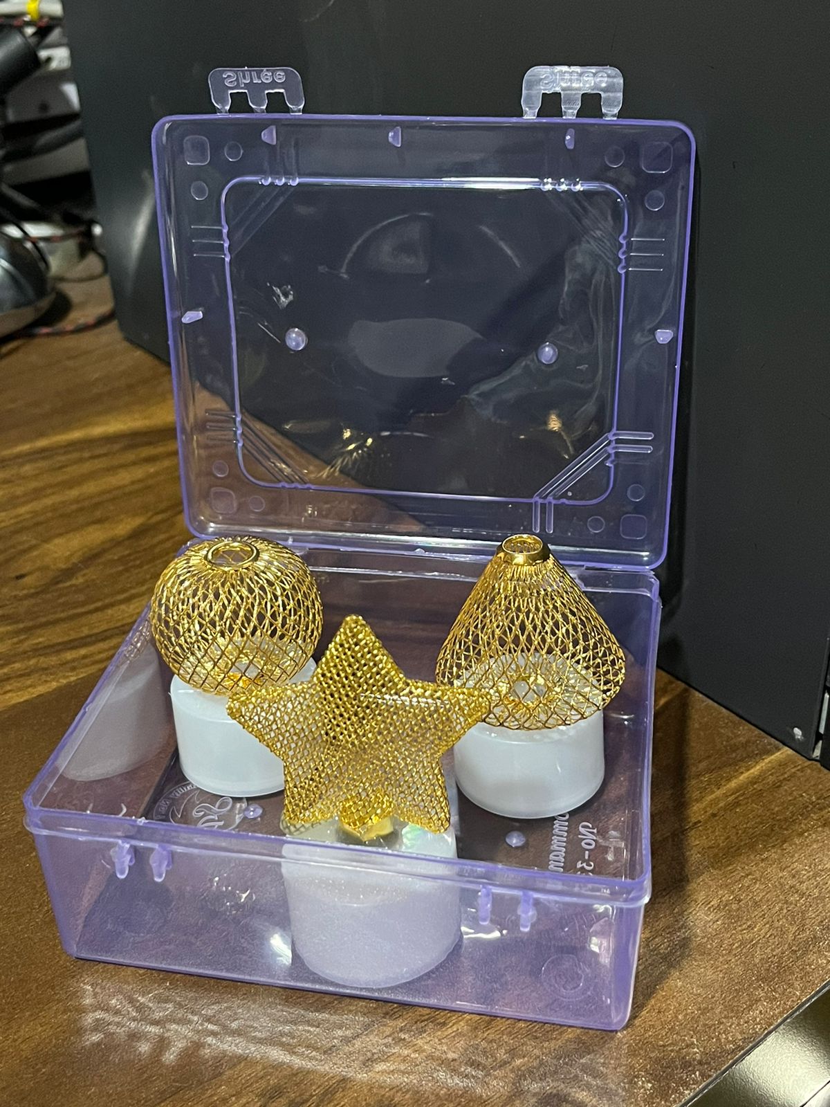 A single flameless LED candle shown in hand for scale and detail.