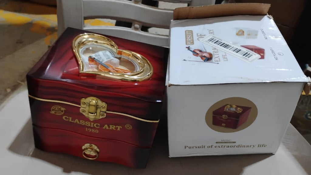 The Ballerina Music Box displayed in its gift-ready packaging.