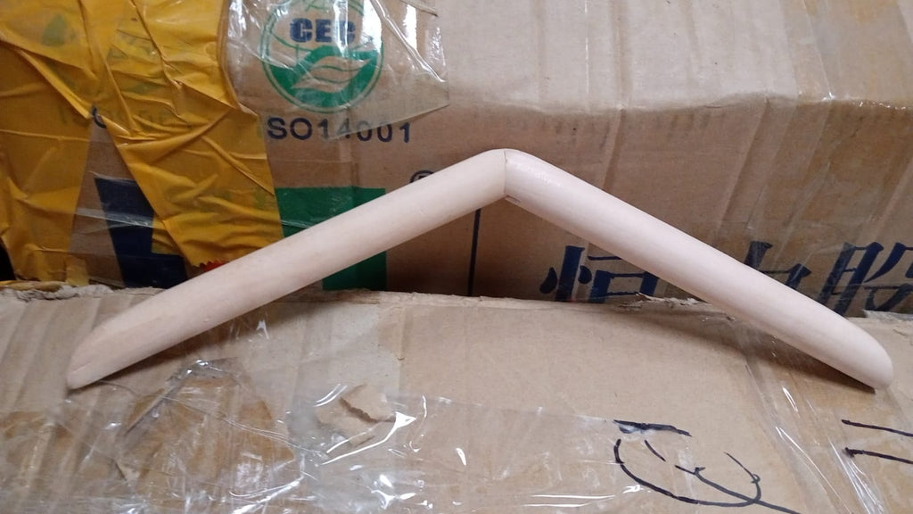 Collection of wooden hangers suitable for various types of clothing.