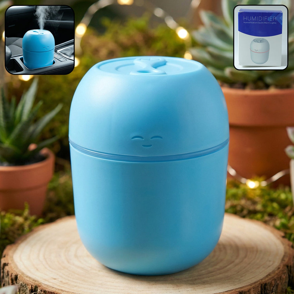A sleek white USB Air Humidifier emitting a fine cool mist on a clean surface.