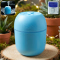 A sleek white USB Air Humidifier emitting a fine cool mist on a clean surface.