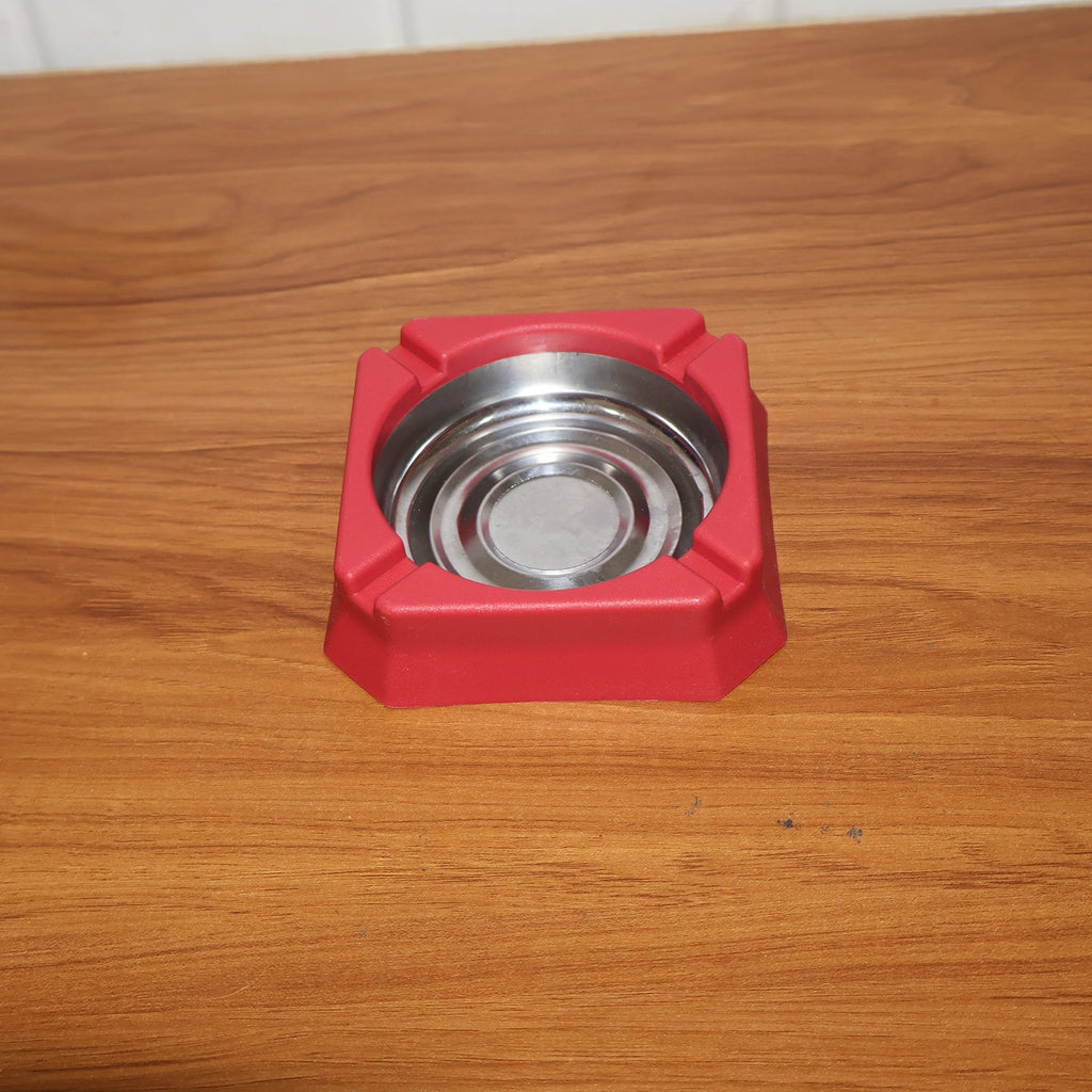 Heat-resistant ashtray in a home or office setting for ash disposal