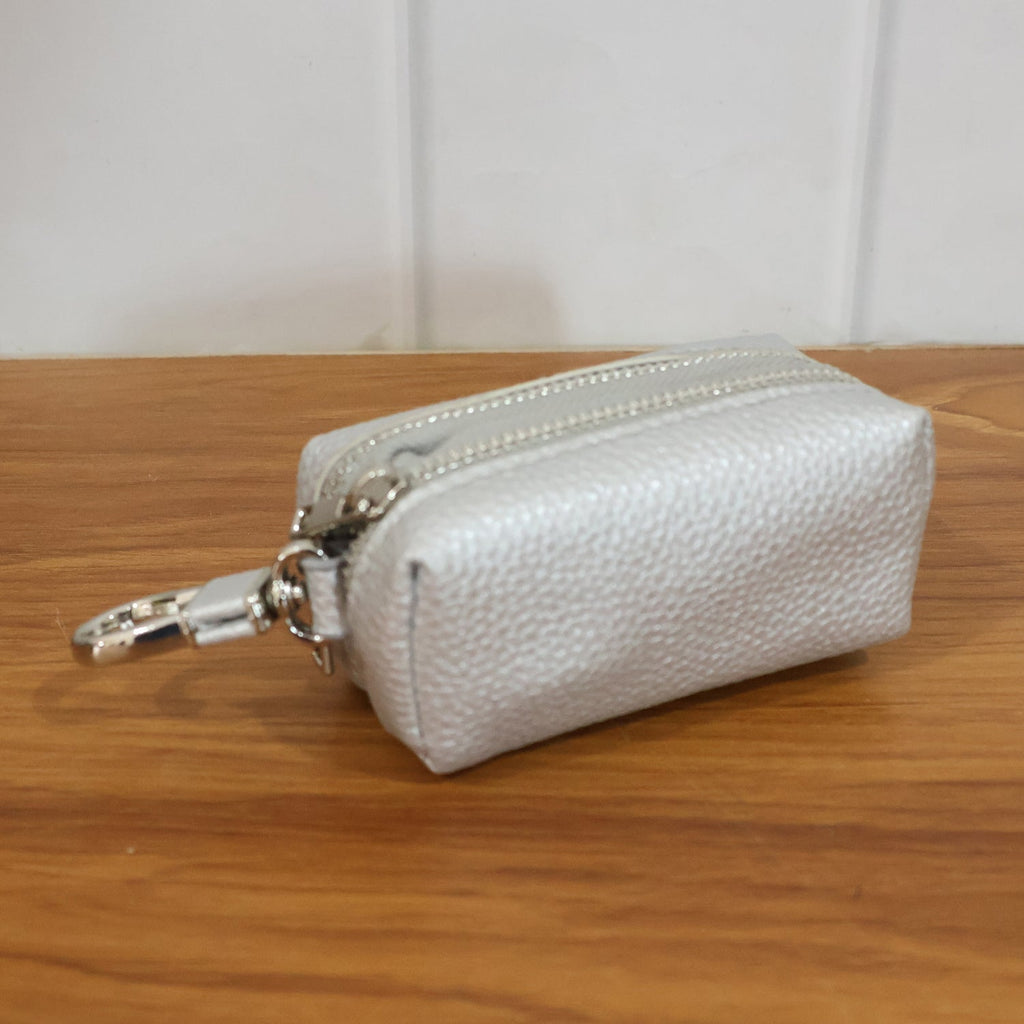 Travel-ready mini key pouch with zipper closure and clip