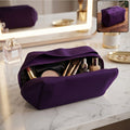 Blue waterproof travel makeup organizer bag with spacious interior