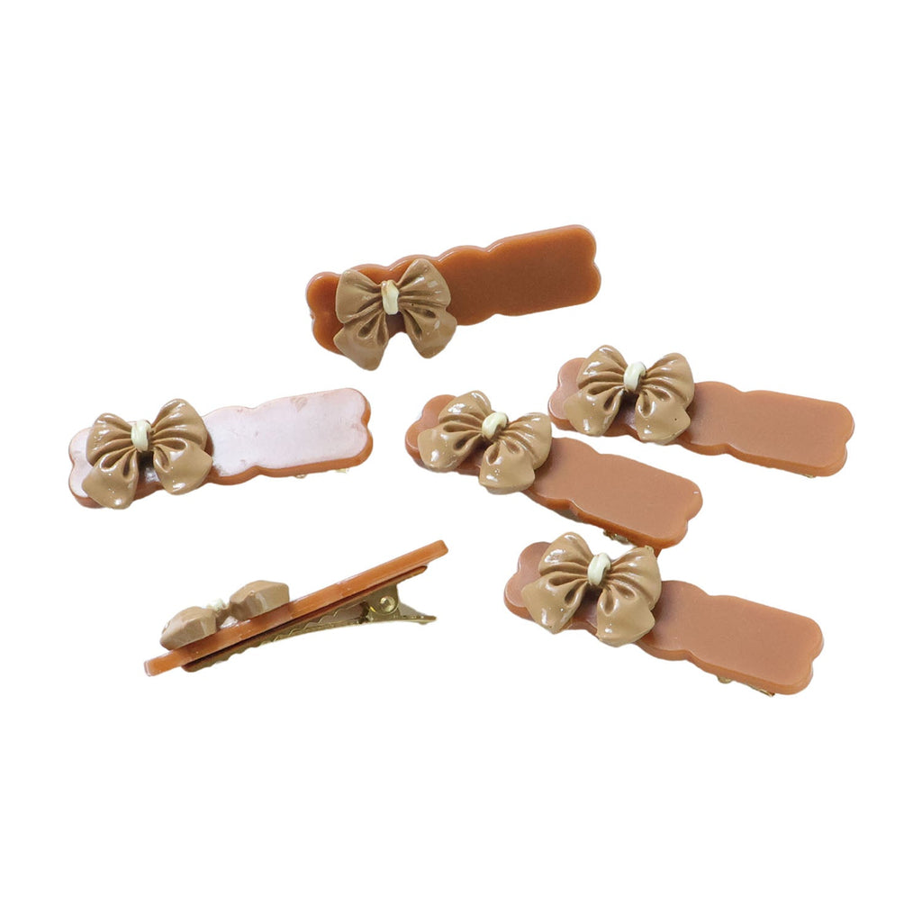 Collection of minimal solid-tone bow hair clips for women