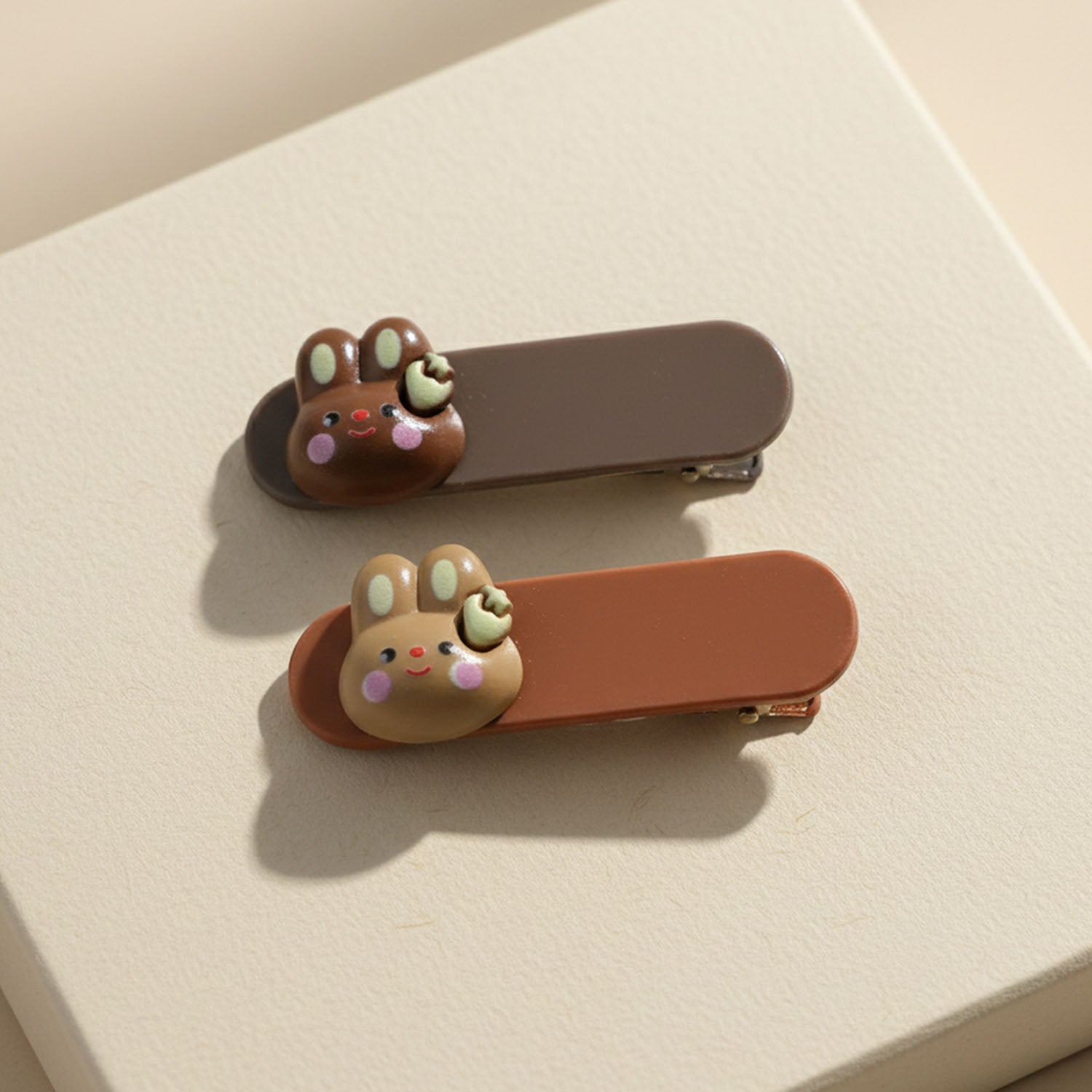 Neutral image of bunny face hair clips set for daily fashion looks