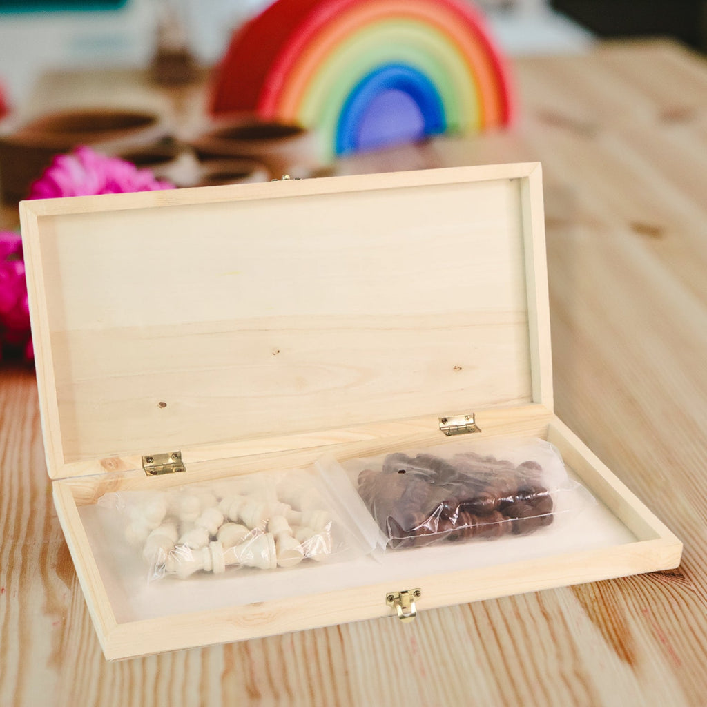The Folding Wooden Chess Board shown in its compact, folded state, highlighting the internal storage.