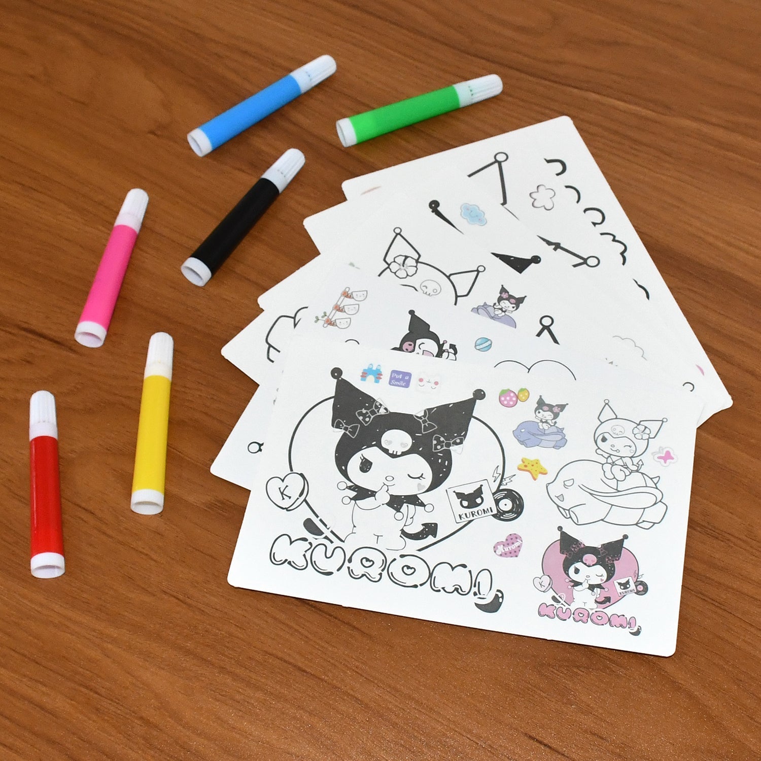 Kids coloring book set with Kuromi theme displayed on white background