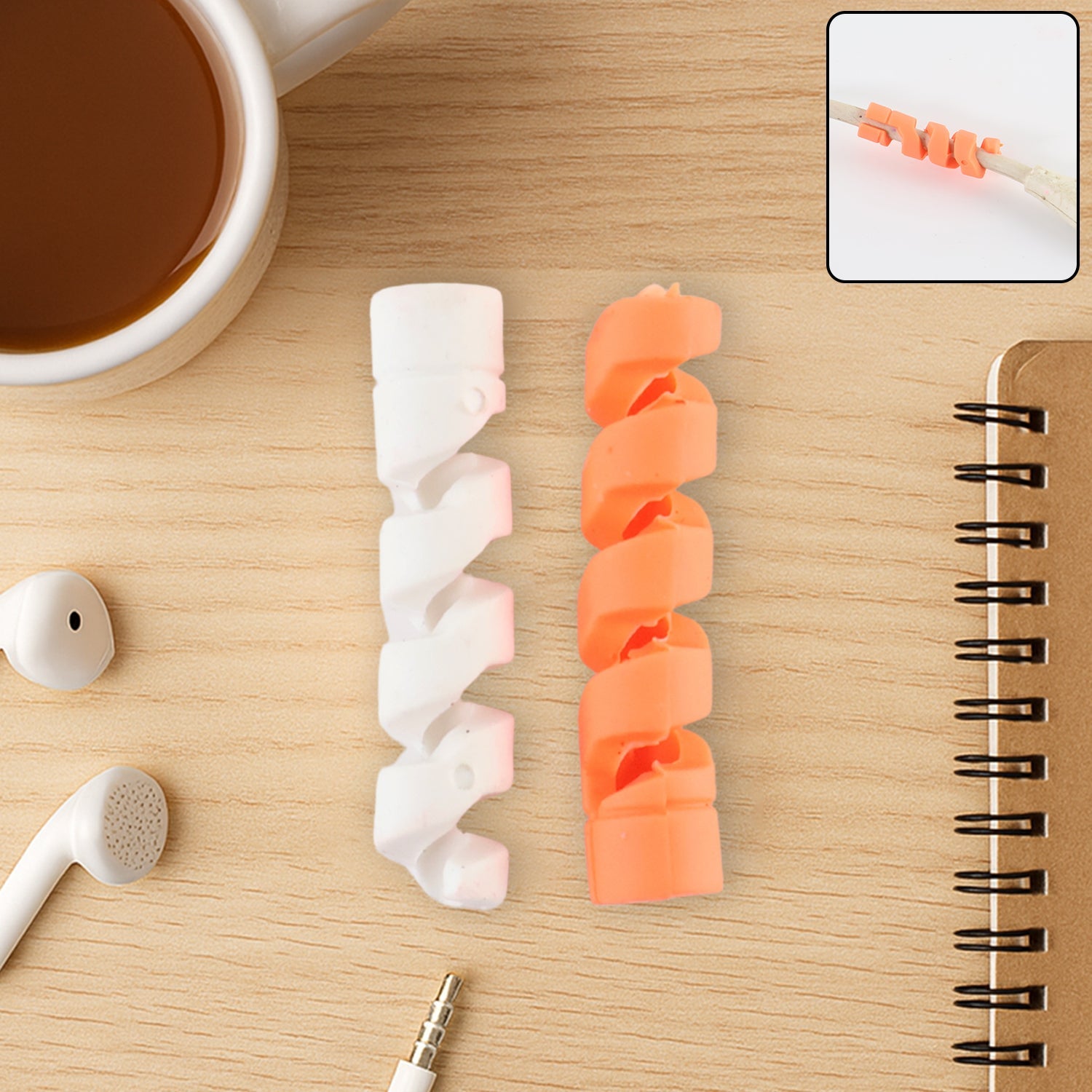Cable protector wrapped around a white charging cable, preventing fraying.