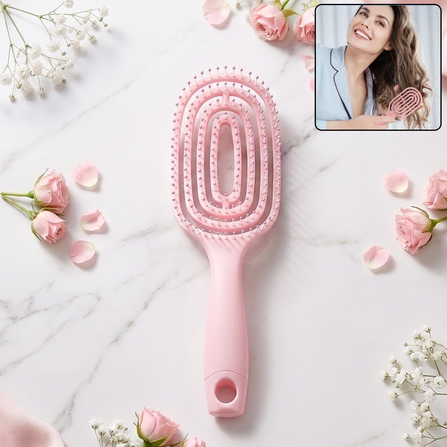 Pink curved vented detangling hair brush designed for effortless hairstyling