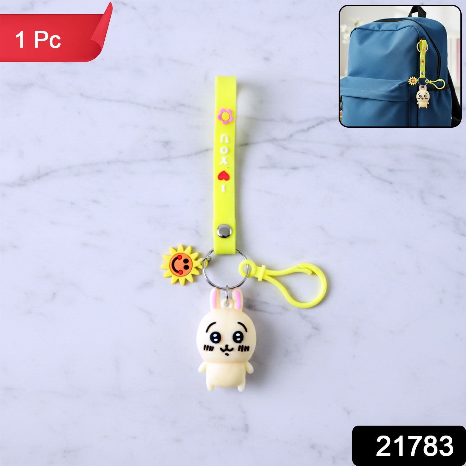 Cute cartoon bunny silicone keychain attached to a backpack strap