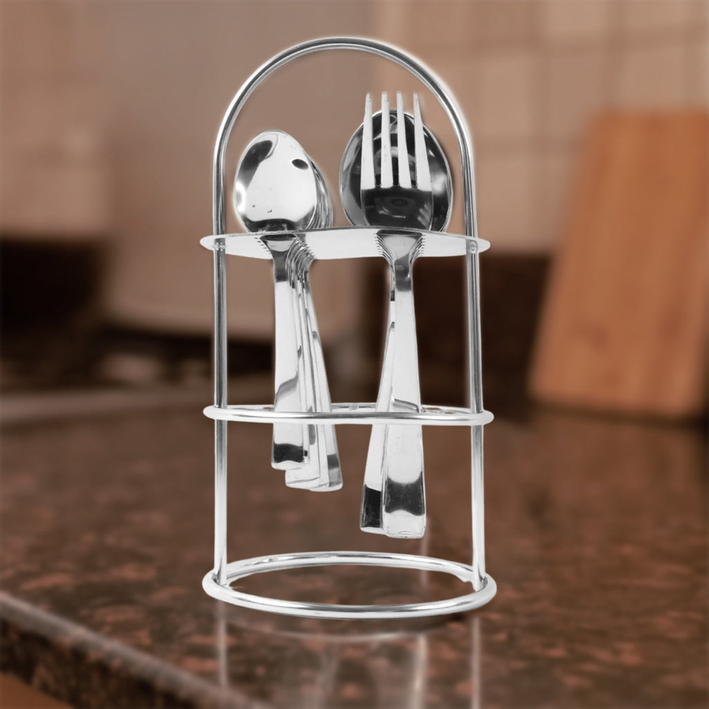 Stainless steel cutlery set with elegant stand on kitchen counter