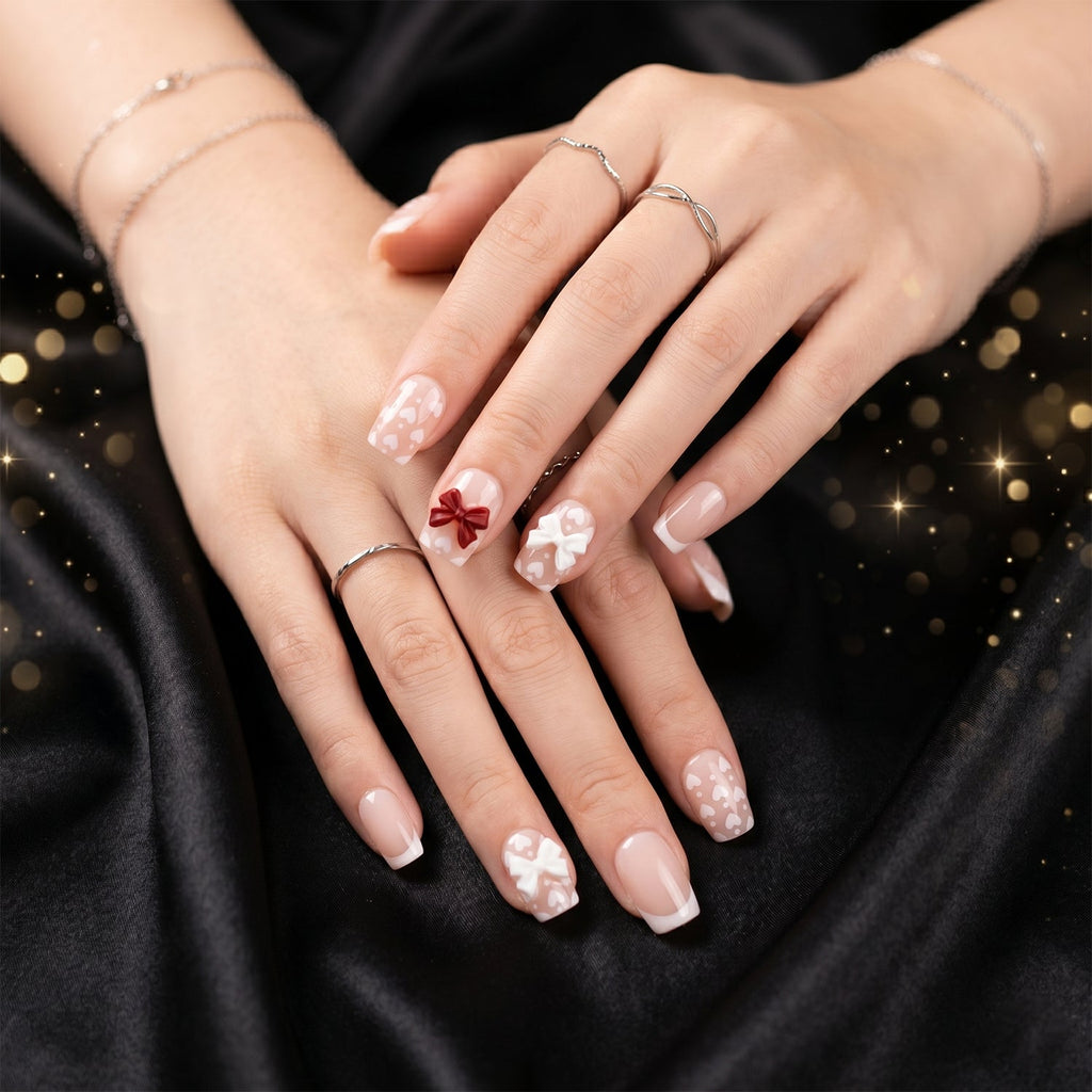Close-up of glitter 3D floral press-on nails highlighting intricate petal and crystal embellishments.