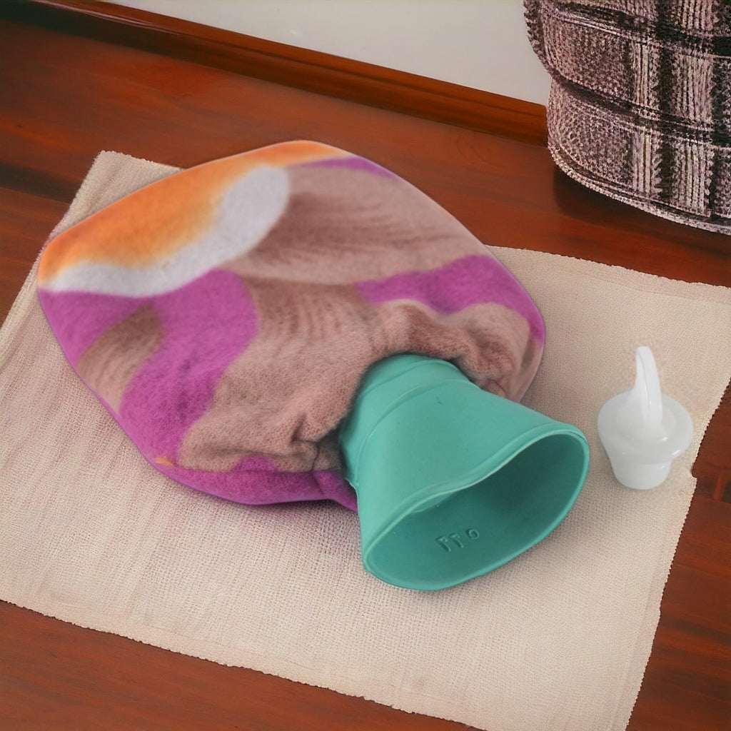 Hot water bottle bag covered with cozy fabric sleeve for comfort