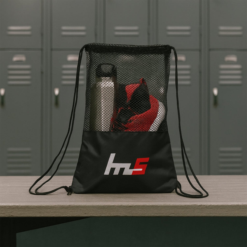 Close-up of the breathable mesh fabric and durable base of the gym sack.