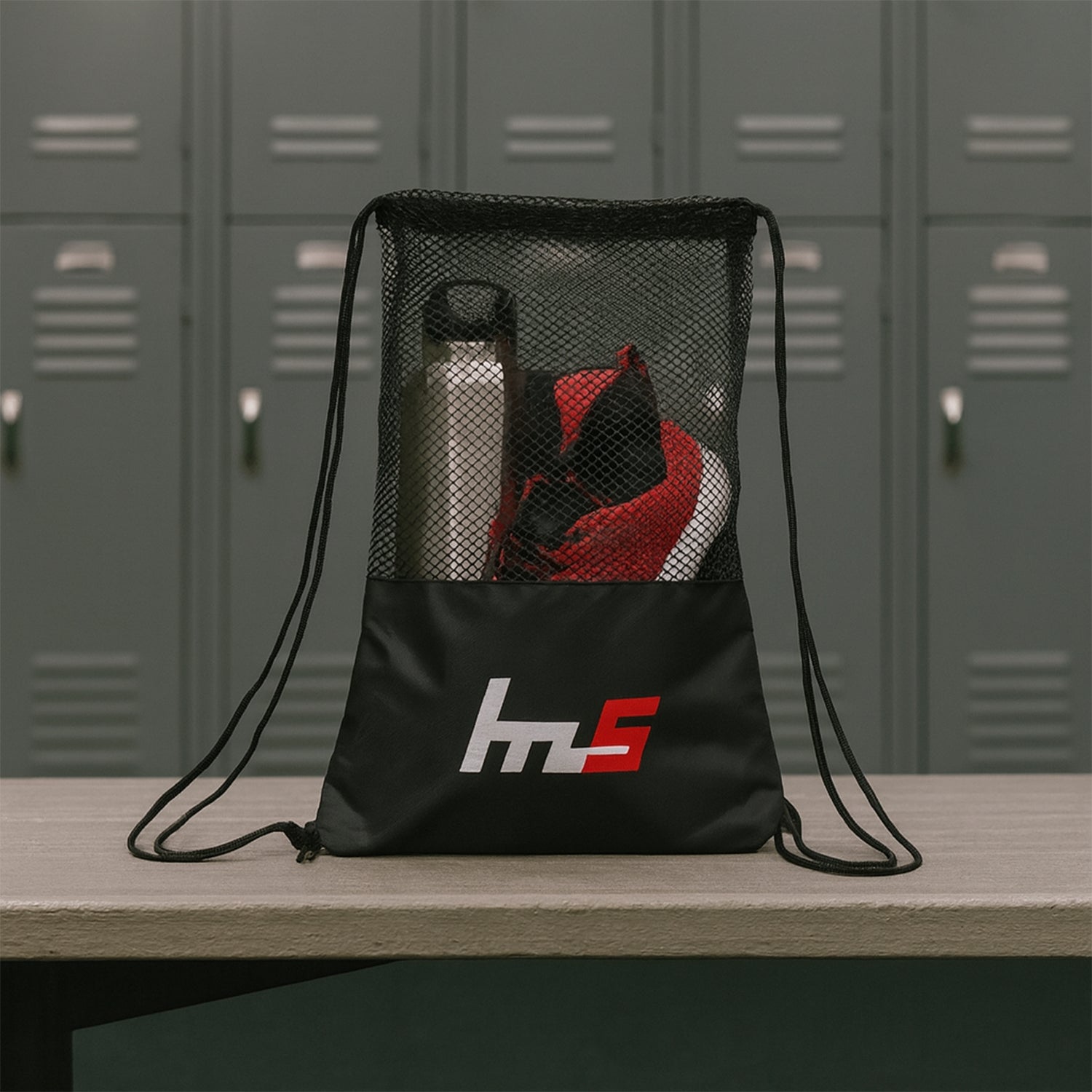 Close-up of the breathable mesh fabric and durable base of the gym sack.