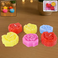 Set of six rose shaped wax candles in vibrant colors for home decoration