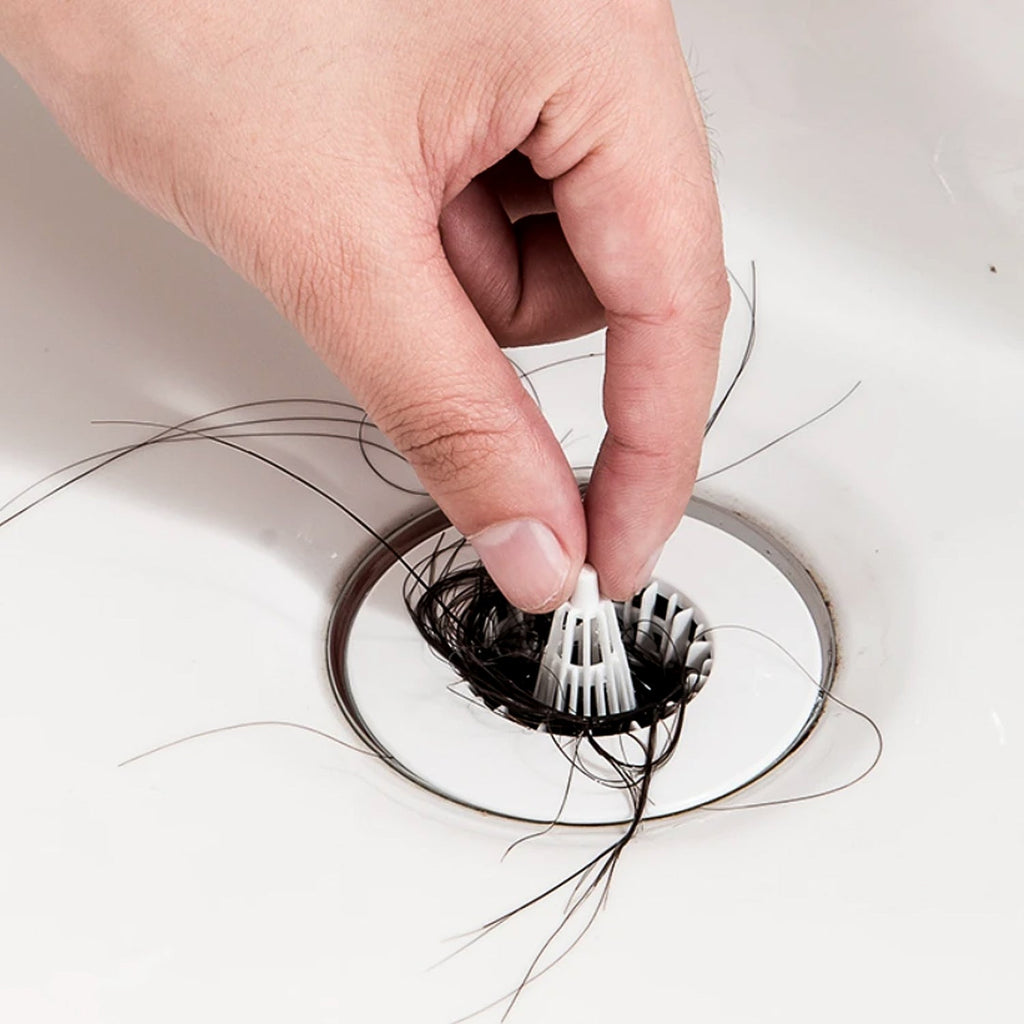 Close-up of hair trap strainer filter for sink drains