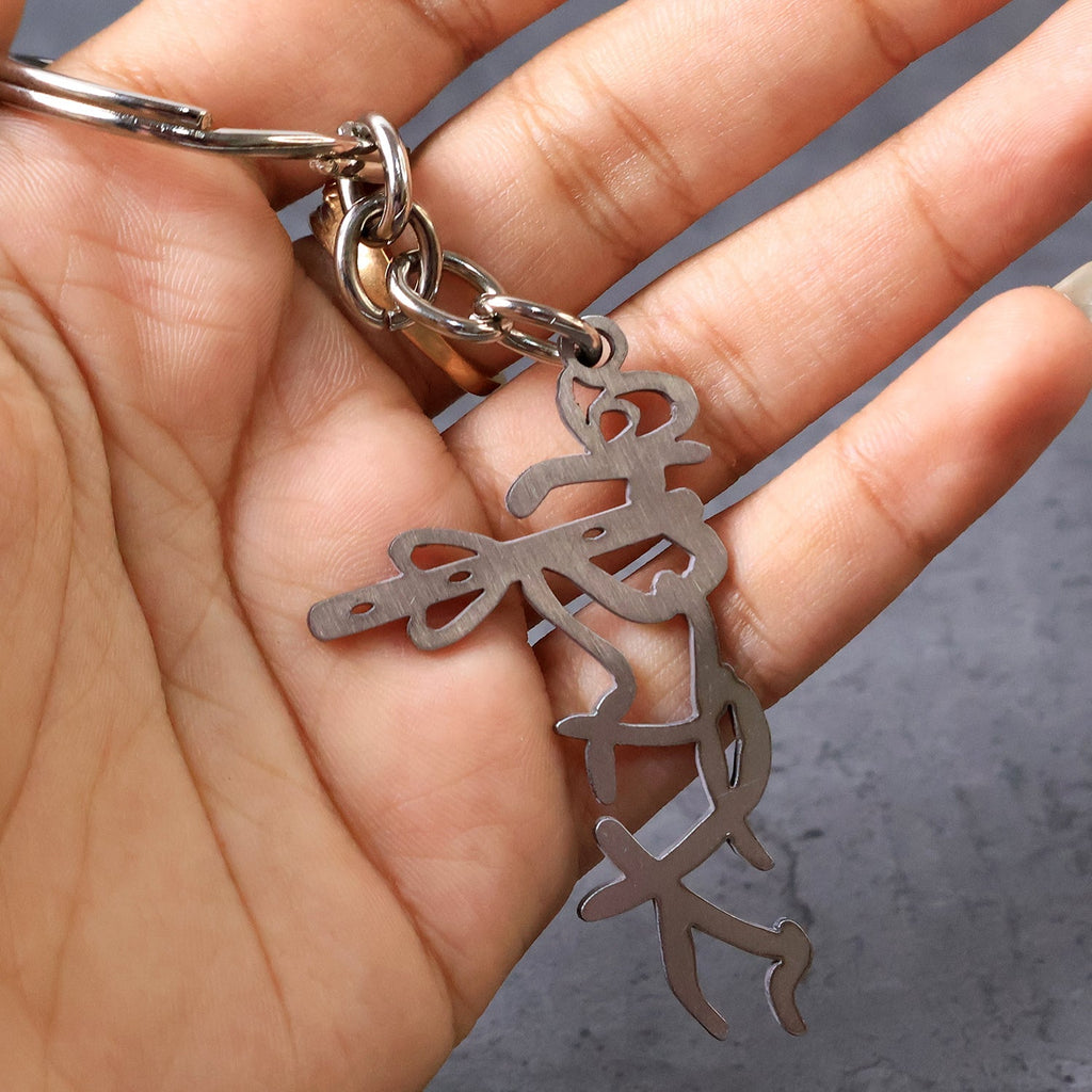 Auspicious Krishna flute style metal key holder accessory