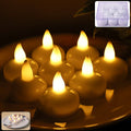 Set of round LED flameless tealight candles glowing with warm flickering light