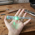 Digital voltage tester pen detecting electricity on electrical outlet with LED lights