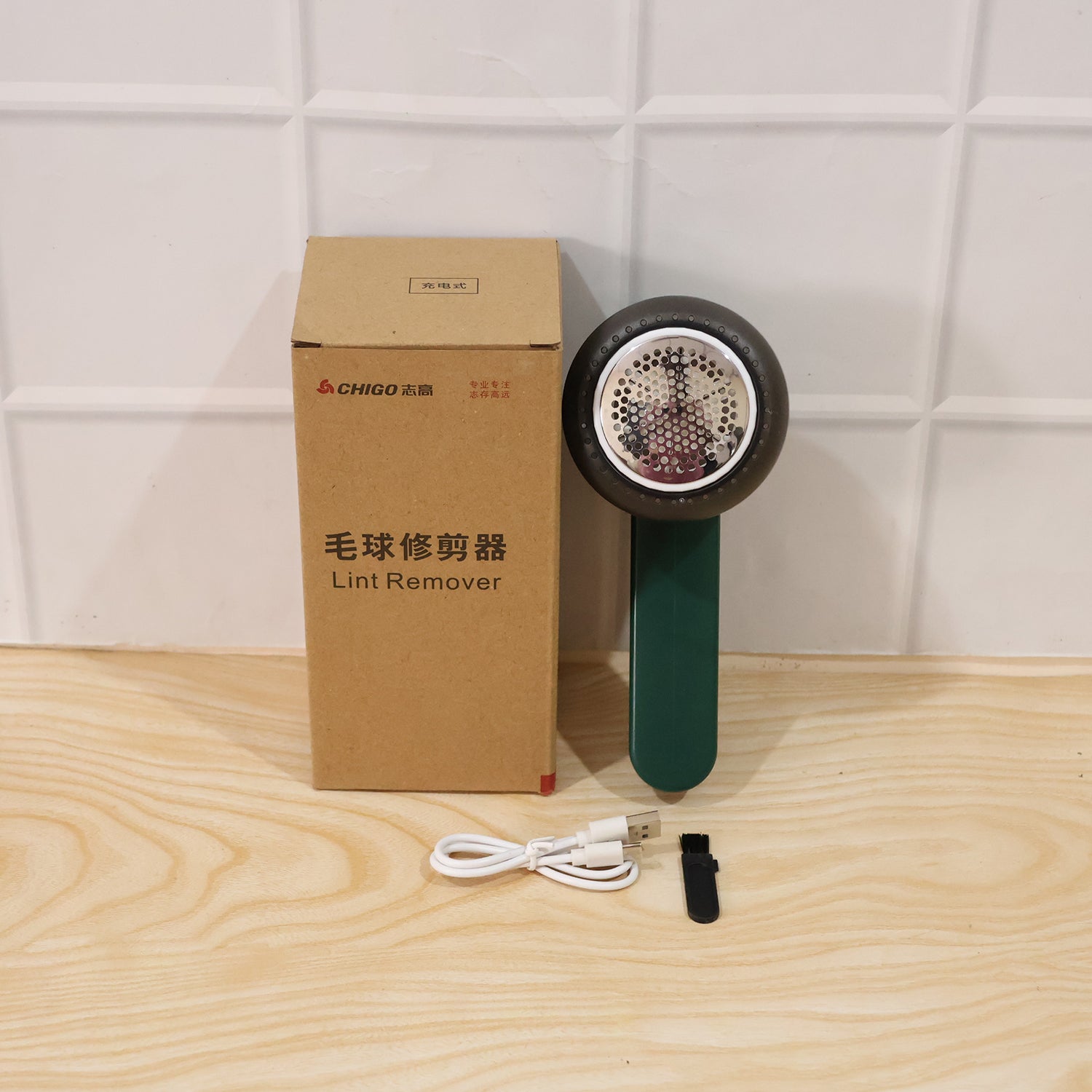 Portable lint remover in use