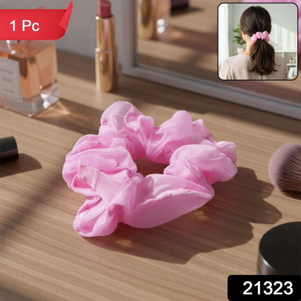 Fashionable pink soft elastic hair scrunchie providing gentle hair hold