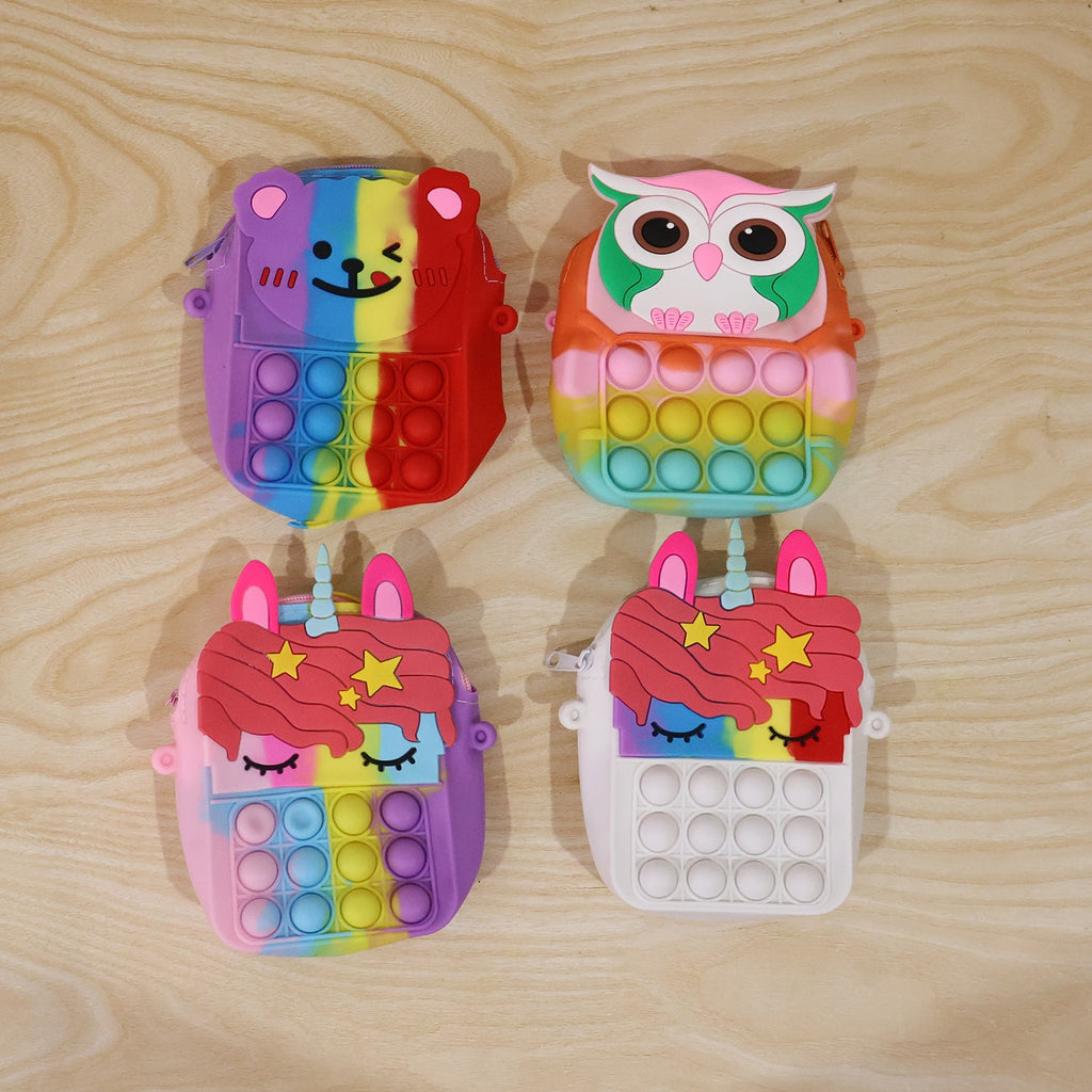 Kids pop it silicone shoulder bag showcased as playful fidget toy and purse