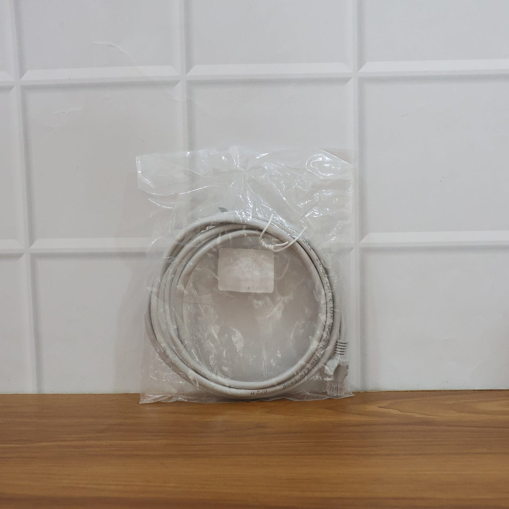 In-use high-speed LAN Ethernet cable connecting devices in office