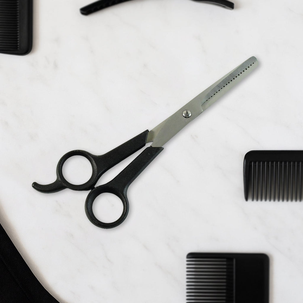 Hair thinning scissors showing detailed micro-toothed blade for bulk reduction