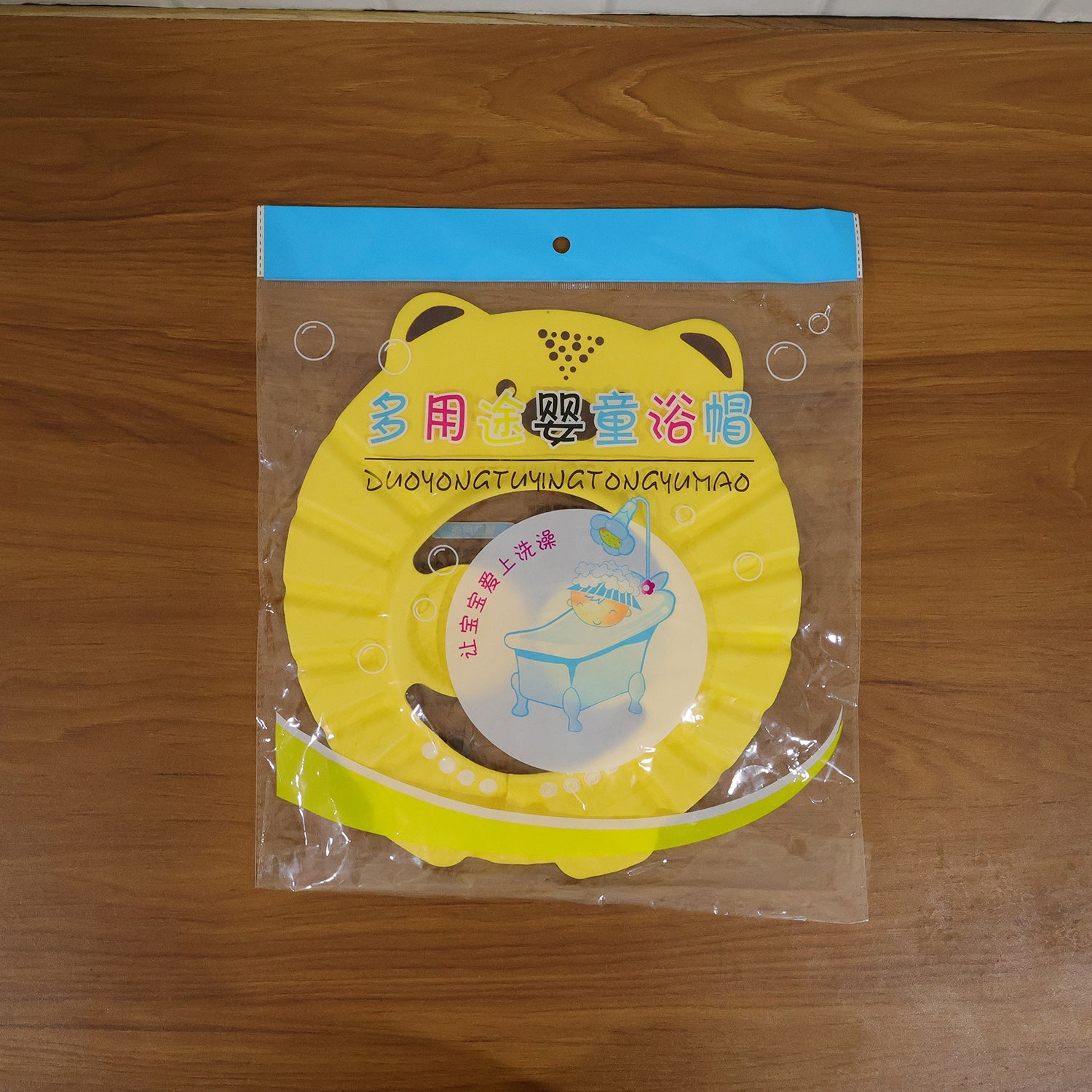 Adjustable baby shower cap for comfortable bath time