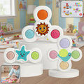 White baby spinner toy set with strong suction bases attached to high chair