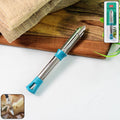 Apex stainless steel vegetable peeler with ergonomic handle on kitchen counter
