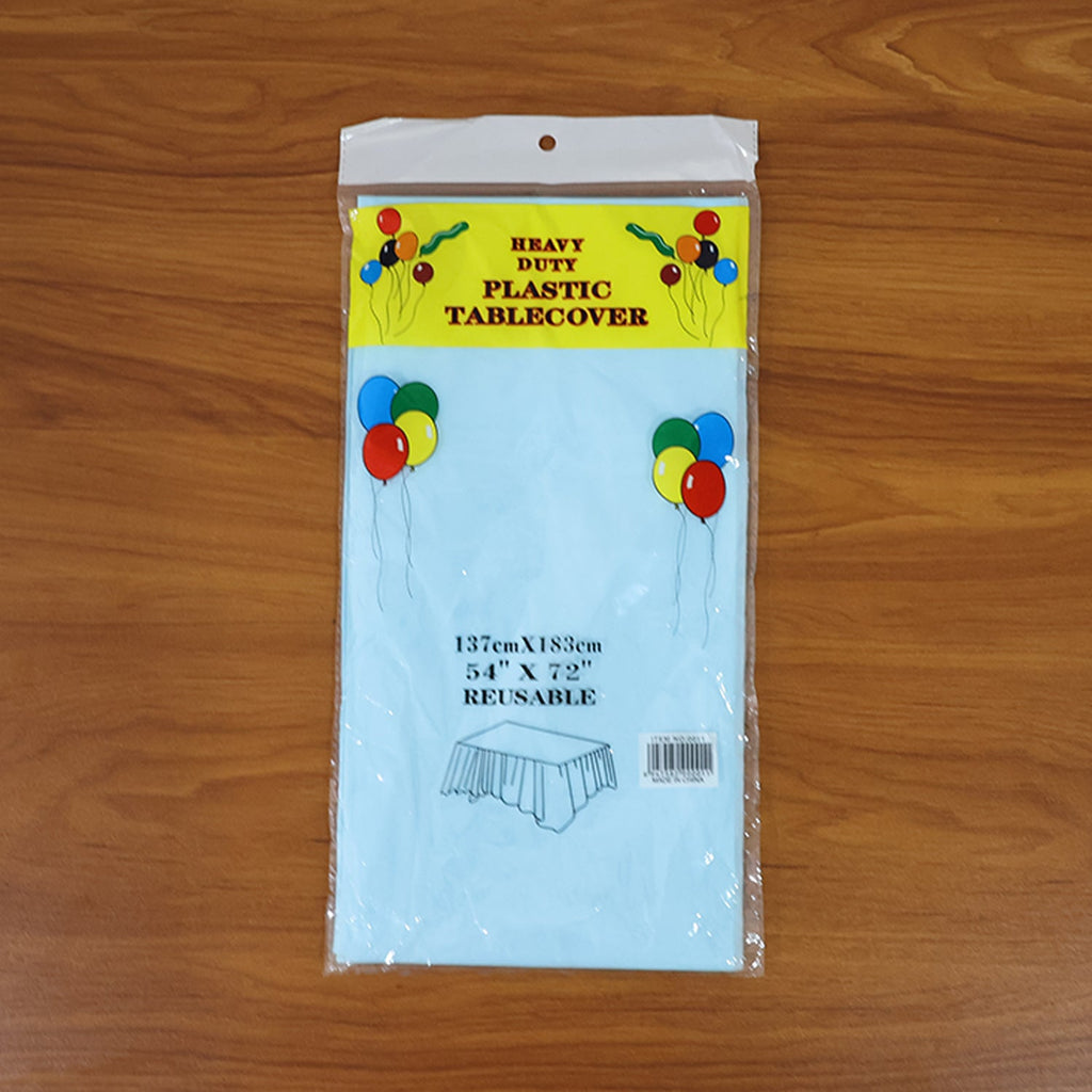 Disposable plastic table cover spread fully on rectangular table