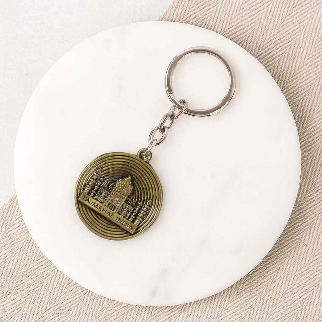 Side view of durable metal souvenir Taj Mahal keychain