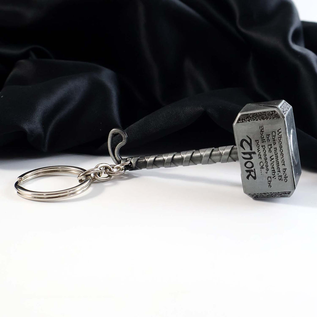 Close-up of hammer handles and metal alloy keychain detail
