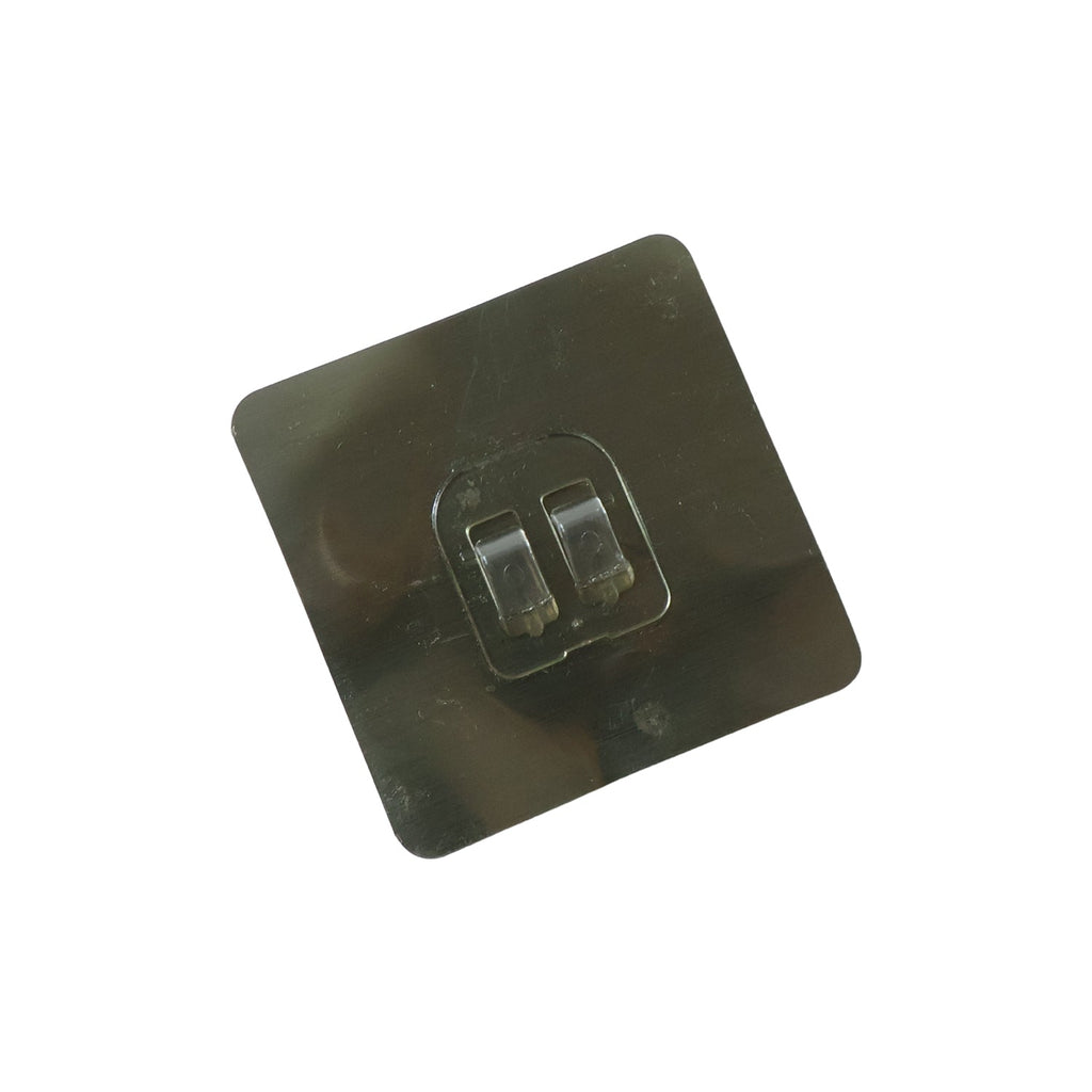 GlimmerHome transparent hook securely attached to a glass surface, blending in.