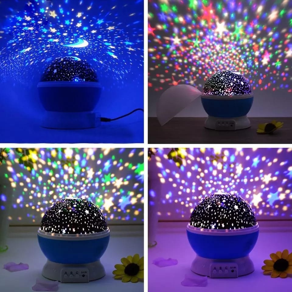 Star projector night lamp casting stars and moon patterns on a wall.