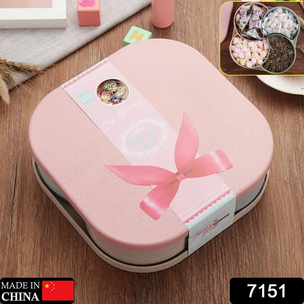 A pink-toned multi-compartment snack box, ideal for organized food storage.