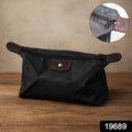 Waterproof multipurpose travel organizer pouch in black with brown detailing