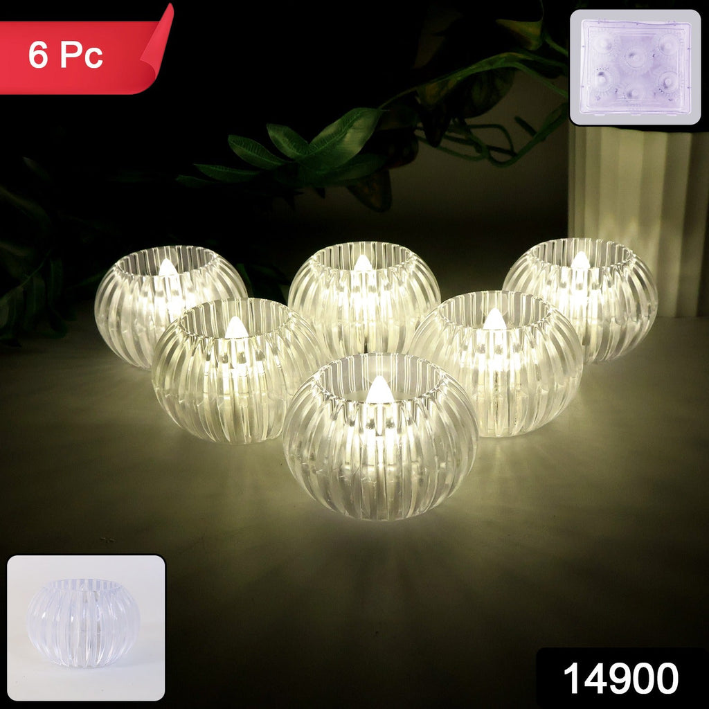 Close-up of crystal design LED flameless tealight candle glowing warmly