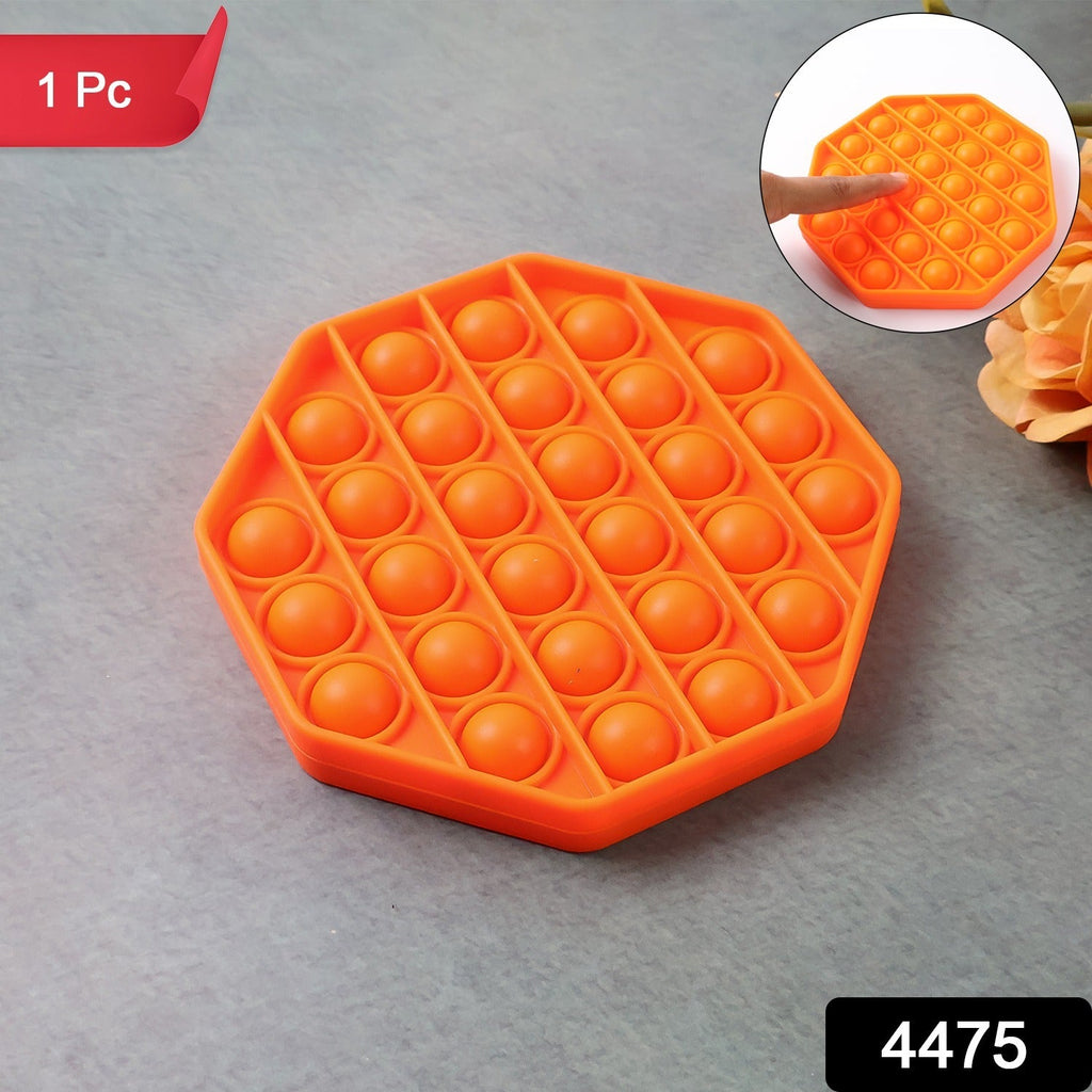 Hand holding Hexagon silicone Pop It Fidget Toy showing popping action