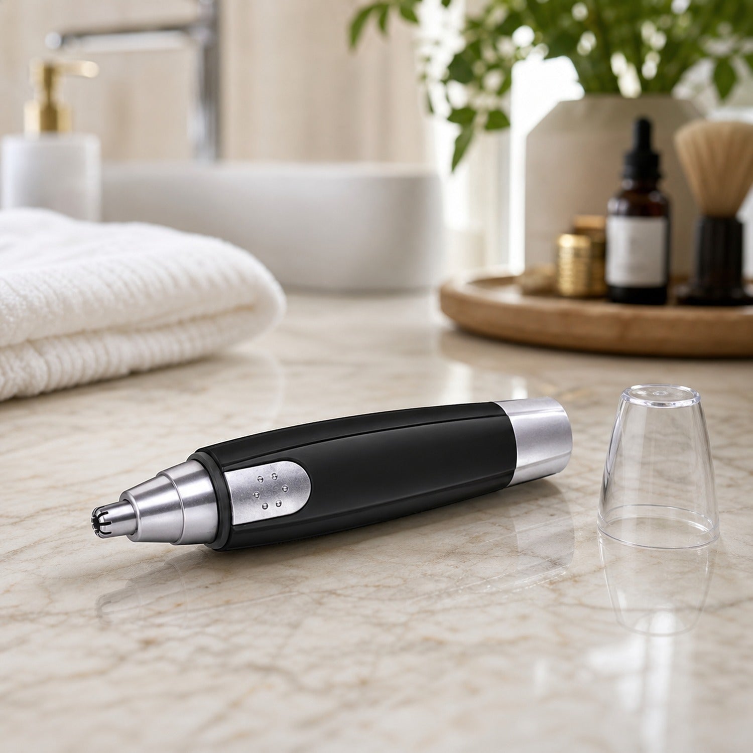 Top view of the battery-operated nose hair trimmer demonstrating its precision tip.